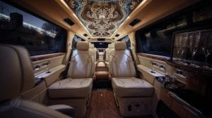 Interior view of a luxury limousine featuring a spacious ceiling and plush seating, ideal for upscale limo rentals.